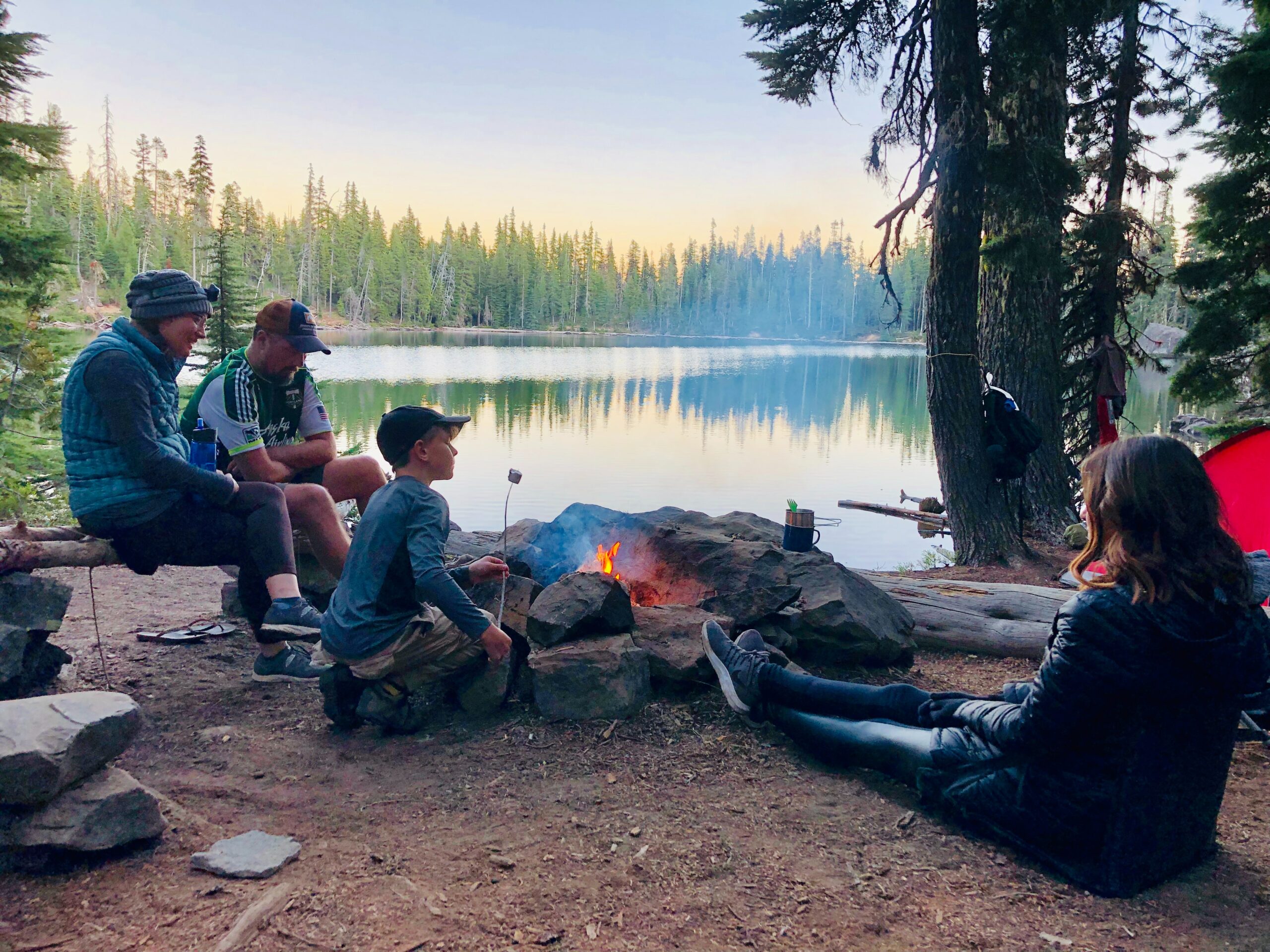 family around a campfire